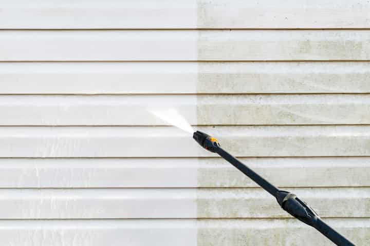 Residential exterior power washing in Addison, TX: Before and after transformation.